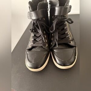 Black High-Top Sneakers with Gold Accents